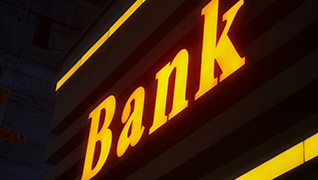 illuminated in yellow words BANK