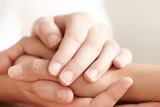 Hands holding each other